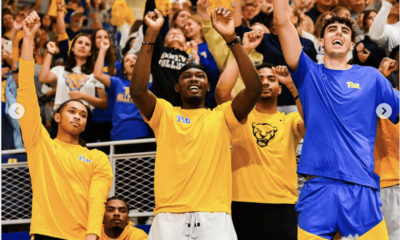 From left to right: Pitt basketball players Jaland Lowe, Marlon Barnes, Papa Amadou Kante, Ishmael Leggett, and Guillermo Diaz Graham at the Pitt volleyball game.